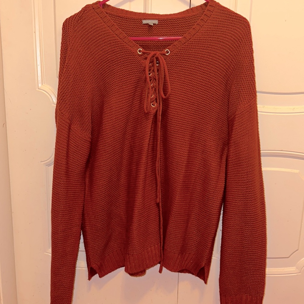 Long sleeved burnt orange sweatshirt. Charlotte Russe brand (L)